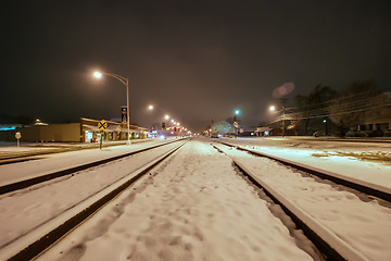 Image showing snow covered train tracks