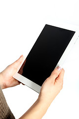 Image showing Female hands holding a blank tablet