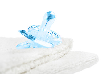 Image showing Baby pacifier on towel