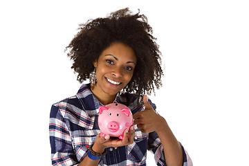 Image showing Female afro american with piggy bank