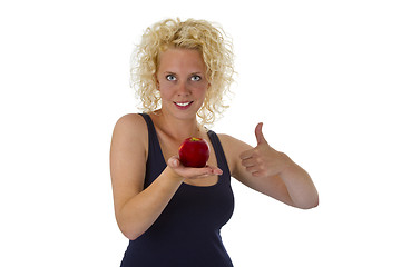 Image showing Beautiful blond woman holding red apple