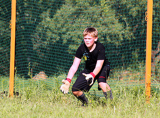 Image showing Teenage Boy Soccer Goalie Practicing