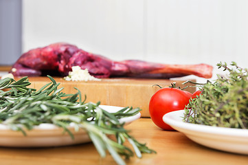 Image showing Vegetables And Meat On Kitchen Counter