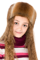 Image showing The girl in a winter fur-cap