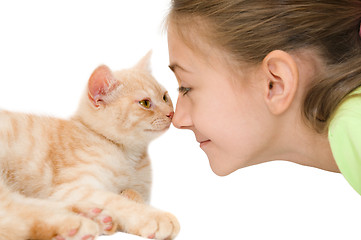 Image showing The girl with a red kitten
