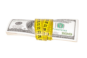 Image showing Dollar banknote and measure tape