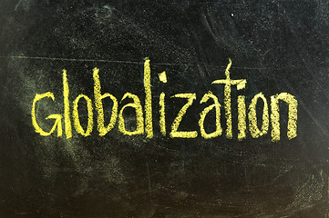 Image showing business globalization written on blackboard 