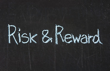 Image showing Risk and Reward on blackboard