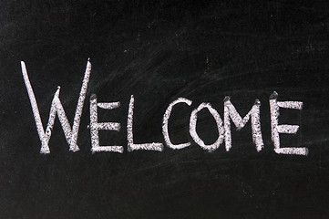 Image showing welcome handwritten in script in chalk on a blackboard 