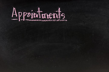 Image showing  The word appointments handwritten with chalk  on a blackboard