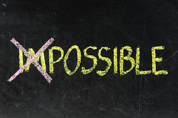 Image showing Chalkboard writing - concept of impossible or possible 