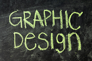 Image showing Graphic design word- white chalk handwriting on isolated vintage slate blackboard 