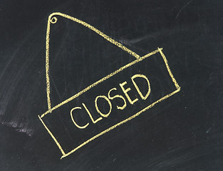 Image showing Chalk drawing - 'Closed' word written on chalkboard 