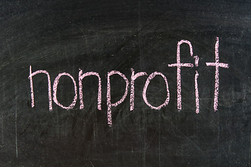 Image showing The word NONPROFIT handwritten with chalk  on a blackboard 