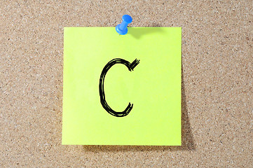 Image showing C grade written on a test paper. 