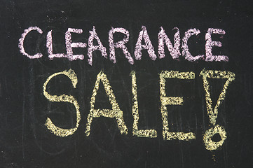 Image showing Clearance sale words written on the chalkboard 