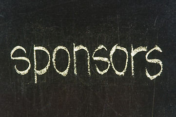 Image showing The word SPONSORS handwritten with chalk  on a blackboard 