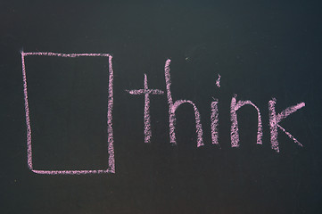 Image showing Think Outside the Box written in white chalk on a black chalkboard 