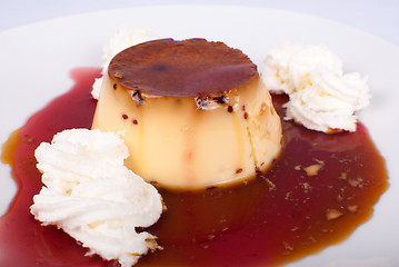 Image showing Flan in fruity sauce