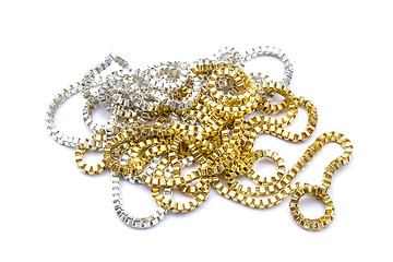 Image showing Silver and gold necklaces