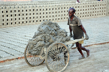 Image showing Laborer at a brick factory