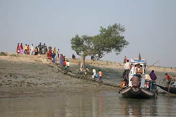 Image showing Wooden boat crosses the Ganges River