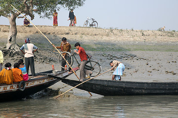 Image showing Wooden boat crosses the Ganges River