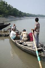 Image showing Wooden boat crosses the Ganges River