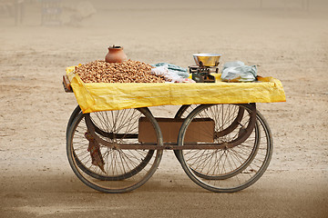 Image showing Counter to sell roasted peanuts. India.