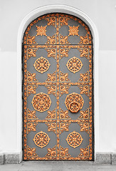 Image showing Antique door with gold ornaments