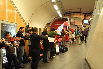Image showing Orchestra plays on the metro station in Paris