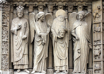 Image showing Emperor Constantine, an angel, Saint Denis holding his head, and another angel