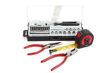 Image showing screwdriver toolbox with set of bits, pliers and measuring tape