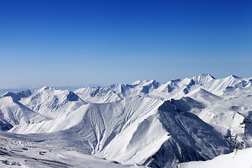 Image showing Snowy mountains and blue sky