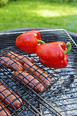 Image showing Sausage and sweet red pepper, roasted on the grill