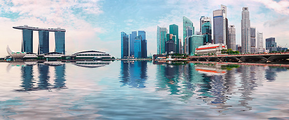 Image showing Singapore skyline with skyscrapers and reflection in water