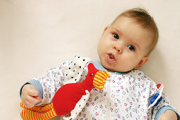 Image showing Small baby with toys