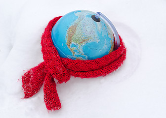 Image showing red scarf earth globe sphere winter snow concept 