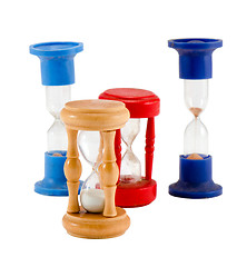 Image showing different sand glass clocks timers isolated white 