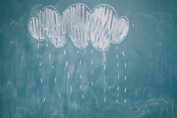 Image showing Drawing of rain falling from cloud on chalkboard