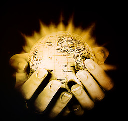 Image showing Globe in a girl's hands