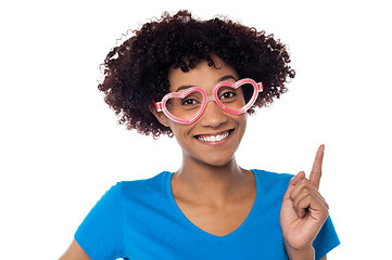 Image showing Pretty woman wearing funny heart shaped frame