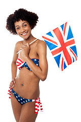 Image showing Stars and stripes bikini model holding UK flag