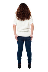 Image showing Back view of a long haired woman over white