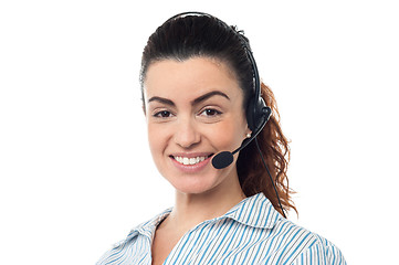 Image showing Closeup smiling portrait of a call centre executive