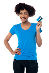 Image showing Beautiful female mode hlolding up cash card