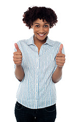 Image showing Excited woman gesturing double thumbs up