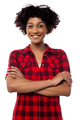 Image showing Young woman in casuals, arms crossed