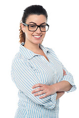 Image showing Bespectacled lady striking pose sideways