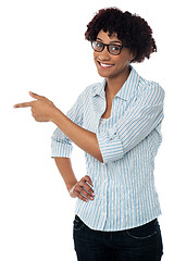 Image showing Casual business lady indicating sideways